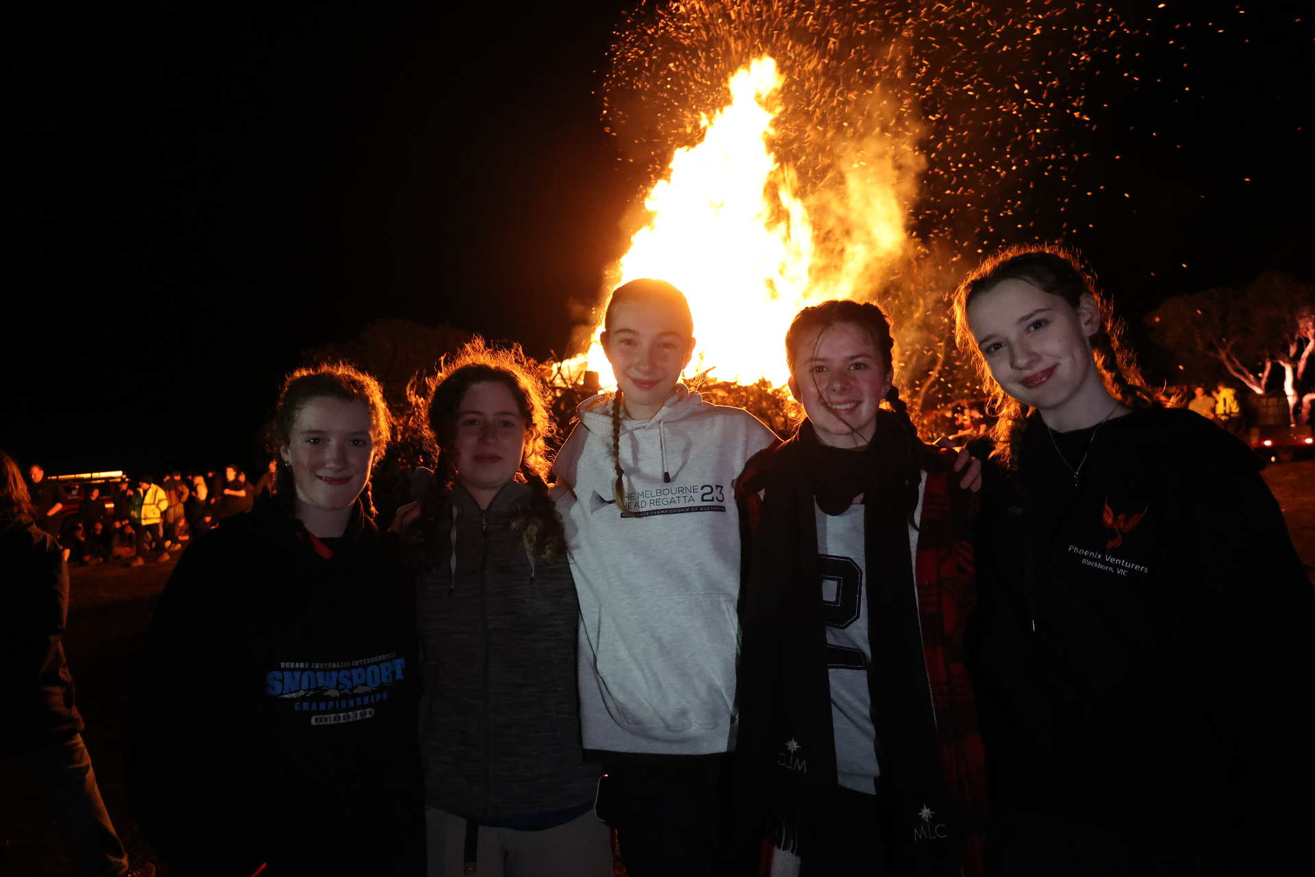 Venturers in front of the Winter Gathering bonfire